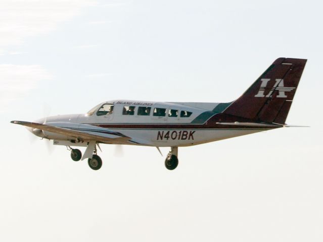 Cessna 402 (N401BK) - Take off runway 24.