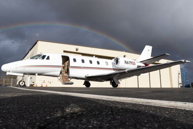 Cessna Citation Excel/XLS (N619QS) - After we landed at GON, I noticed this awesome double rainbow behind our XLS and couldn't help but grab a photo.