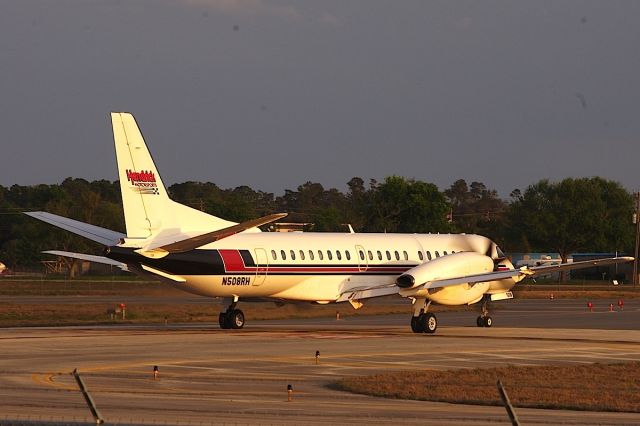 Saab 2000 (N508RH) - Holding Short 25R.