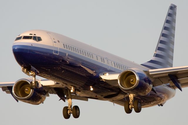 Boeing 737-800 (N737M) - Final for runway 24R at LAX.