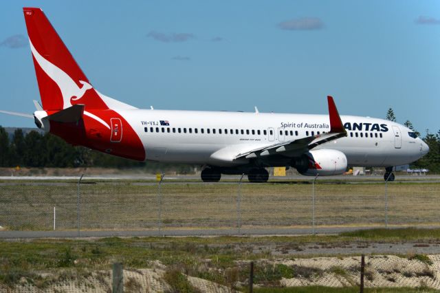 Boeing 737-800 (VH-VXJ) - On taxiway heading for take-off on runway 05. Monday, 14th April 2014.