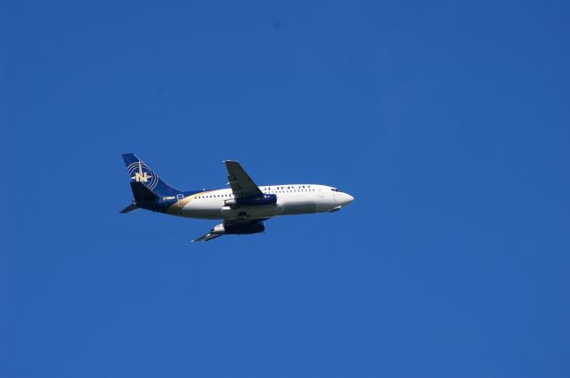 Boeing 737-700 — - J'étais chez-moi demeurant non loin de l'aéroport photographiant cet avion peu après son décollage le 3 juin 2013.