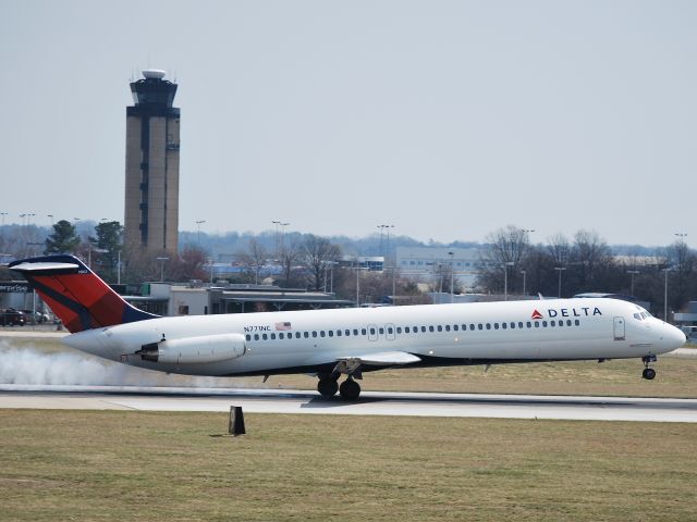 McDonnell Douglas DC-9-50 (N771NC) - Landing on runway 18C - 3/11/09