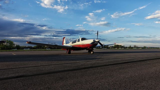 Mooney M-20 (N334FL) - After a long day of survey in Wyoming for Scientific Aviation, I flew 4FL back to base in Boulder. The clouds were such a gorgeous backdrop for my favorite plane