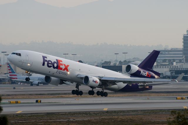 Boeing MD-11 (N573FE) - Early morning T.O. 