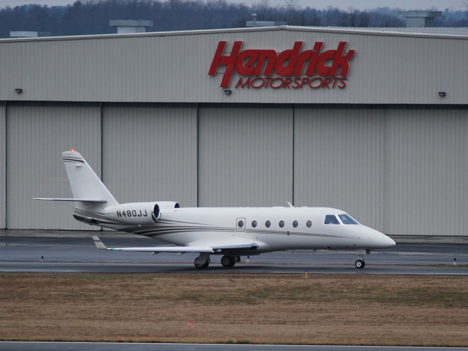 IAI Gulfstream G150 (N480JJ) - Just pulled out of the Hendrick Motorsports hangar and is taxiing to runway 20 at KJQF - 2/18/09 Registered Owner:  Jimmie Johnson Racing II Inc.