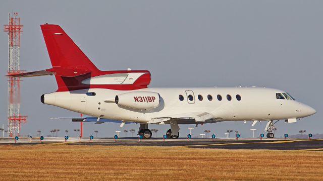 Dassault Falcon 50 (N311BP) - November 17, 2018, Nashville, TN -- Brad Paisley's Falcon 50 is taxiing to runway 20R for departure. Uploaded in low-resolution. Full resolution is available at cowman615 at Gmail dot com. cowman615@gmail.com