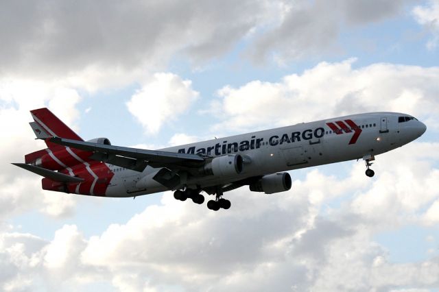 Boeing MD-11 (PH-MCT) - Check out our aviation videos with 100% authentic and non-leveled sound! a rel=nofollow href=http://youtube.com/ilikeriohttps://youtube.com/ilikerio/abr /br /Short final to 9 at MIA on a cloudy day! 04/15/12