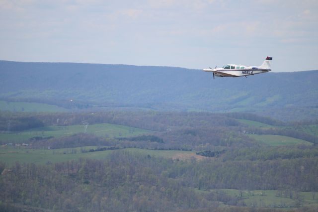 Beechcraft Bonanza (36) (N66LA) - April 22, 2015 W13 to KGSP.  This photo was taken after takeoff out of the Eagles Nest W13  enroute to KGSP.  