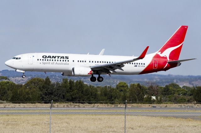 Boeing 737-800 (VH-VYA) - About to put down on runway 05. Friday 19th April 2013.