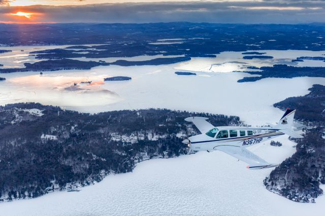 Beechcraft Bonanza (36) (N367HP) - Winter wonderland over Lake Winnipesaukee, NH.