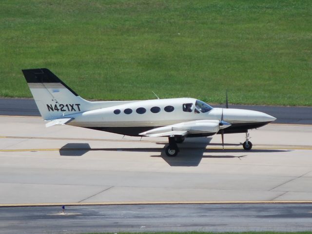 Cessna 421 (N421XT) - PIERSON & WINDLE DDS PA Taxiing out from Landmark Aviation - 6/16/12