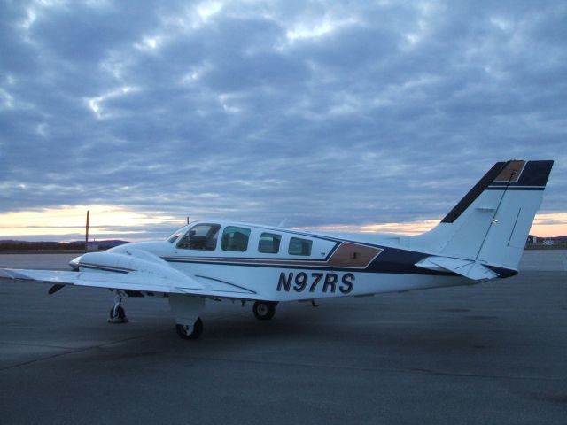 Beechcraft Baron (58) (N97RS) - Parked at Woodward Aviation FBO, Goose Airport NL. June 10/09