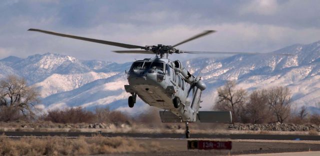 Sikorsky S-70 (16-7822) - As storm clouds move in, a NAWDC MH-60 returns to NAS Fallon (KNFL).