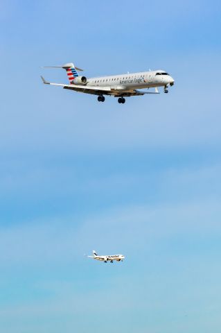 Canadair Regional Jet CRJ-700 (N740SK) - SkyWest CRJ700 and Finnair A350-900 landing in tandem at DFW on 12/25/22. Taken with a Canon R7 and Tamron 70-200 G2 lens.