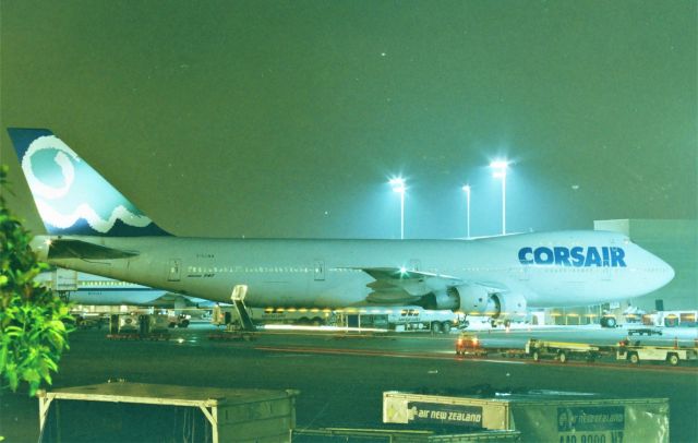 Boeing 747-200 (F-GLNA) - KLAX - TBT circa Sept 1990 shows French Airline Corsair after having arrived from Tahiti on the late evening arrival. There was a TACA 767 right on the edge of this photo I had to stand just right but missed the tree in the view. There used to many areas at LAX one could park and walk around the roadways and get different vantage points. I was in LAX for the Airline Collectible show at the Hacienda Hotel on Sepulveda Blvd at LAX. Fun times.