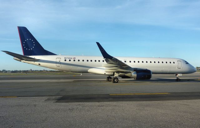 Embraer ERJ-190 (N173HQ) - Republic E-190 N173HQ rests between flights at KLGA on May 15, 2010. Originally N966UW with USAirways this is one of numerous hybrid schemed aircraft in Republics fleet for use with Multiple carriers. Now that they only operate this type for Frontier will likely be repainted into their Animal tail scheme at some point soon.