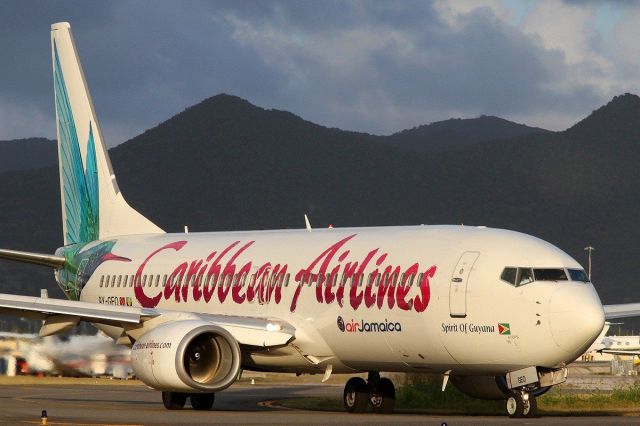 Boeing 737-800 (9Y-GEO) - Caribbean Airlines - Air Jamaica 9Y-GEO Afternoon delight at SXM. Courtesy James Rowson ©