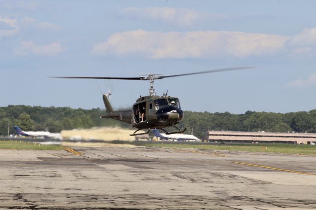 Bell UH-1V Iroquois (N240GH) - Coming back from a Air Adventure, Taken from Hanger 1