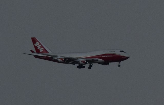 Boeing 747-400 (N744ST) - returning from KVCV on approach to KCOS, in rainbr /17.07.31