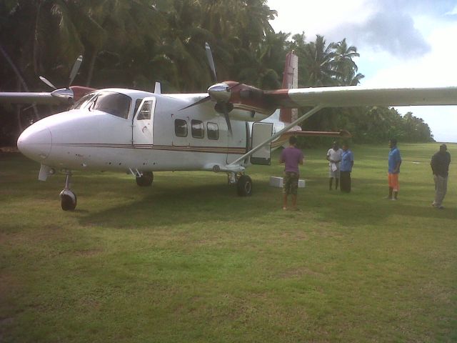 HARBIN Y-12 (SCX9) - Aircraft loading.  Picked up a few cartons and three passengers from the island for the onward flight to Mahe in the Seychelles Islands.  Total flight time this day was approximately 2 hours which included the flight from the earlier island and 20 minutes on the ground here at this paradise of an airfield located in the middle of the Indian Ocean!