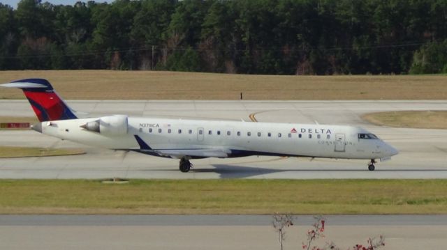 Canadair Regional Jet CRJ-700 (N378CA) - Delay (Go Jet) 6218 departing to New York LGA at 3:02 PM EST.   Taken November 29, 2015 with Song HDR-CX230.  