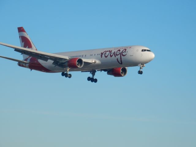 BOEING 767-300 (C-FMLZ) - An Air Canada Rouge 767-300 is seen here on finals to 23 at YYZ!!