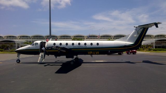 Beechcraft 1900 (VP-LVI) - Left hand view with passenger door open