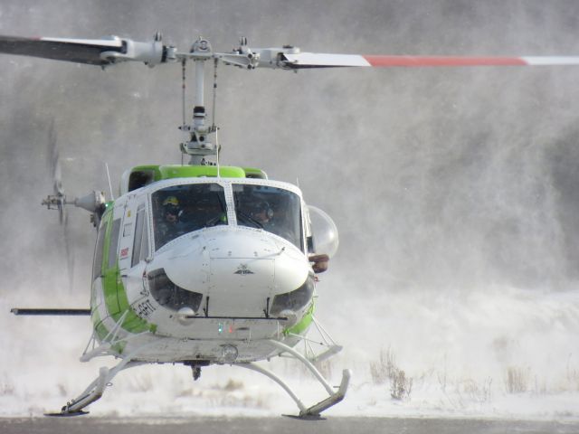 Bell BigLifter (C-GFIT) - C-GFIT, an Heli-Excel Bell 214 clearing the snow off the helipad. Poste-Montagnais, Québec - November 2012