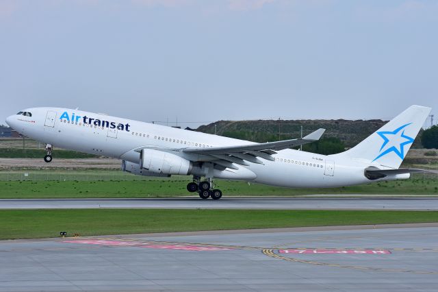 Airbus A330-200 (C-GJDA) - Air Transat Airbus A330-243 departing YYC on June 1.
