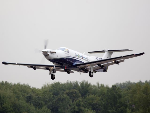 Pilatus PC-12 (N711ZM) - Take off runway 26.