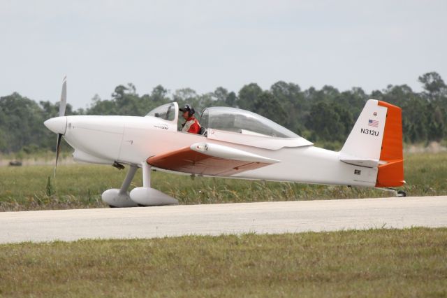 Vans RV-8 (N312U) - Team RV performing at the 2012 Florida International Airshow