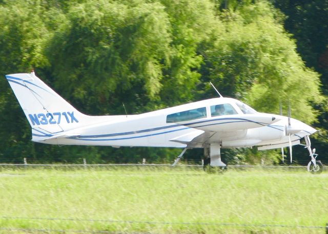 Cessna 310 (N3271X) - At Downtown Shreveport.