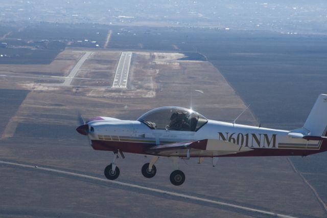 ZENAIR Super Zodiac (N601NM) - Tim Cottam flying his Zodiac. Departure end of Runway 31 visible behind the plane.