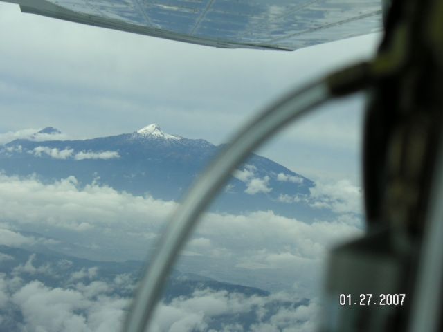 Cessna Skylane (N1672R) - Enroute from Zihuatanejo to Guaymas. On oxygen at 10,500, view of Volcan de Colima, 13,993.