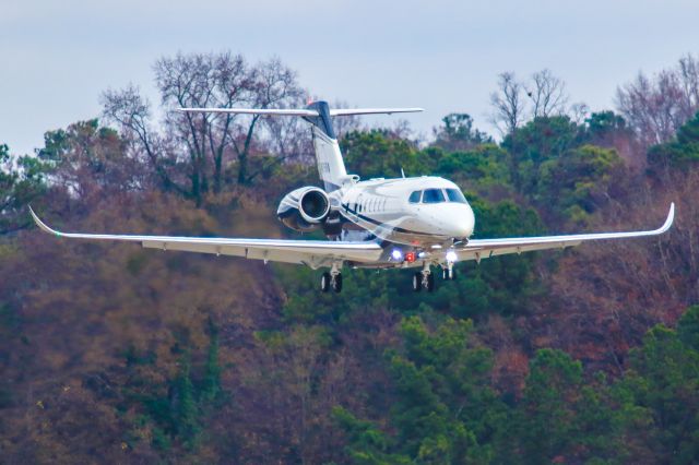 Cessna Citation Longitude (N75RA) - This is a photo of N75RA a 2020 Cessna 700 on final for Atlanta's PDK executive airport. I shot this with my Canon 800mm lens. The camera settings were 1/3200 shutter, F5.6 ISO 800. I really appreciate POSITIVE VOTES & POSITIVE COMMENTS. Please check out my other aircraft photography. Questions about this photo can be sent to Info@FlewShots.com