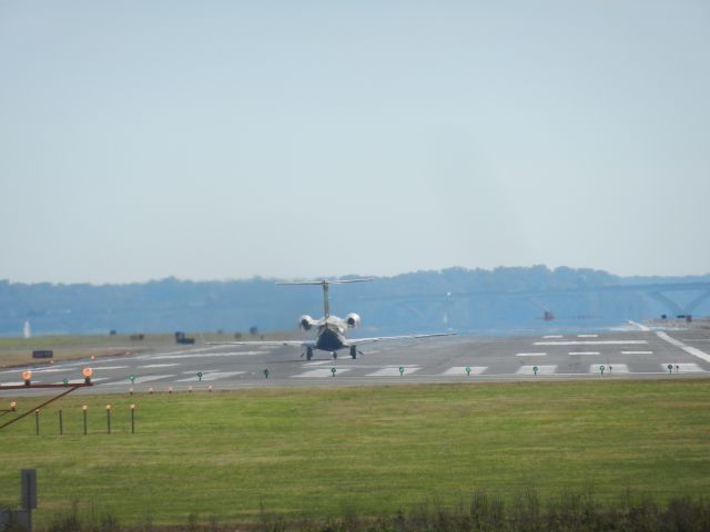 Embraer Phenom 300 (N375FX) - N375FX, A Embraer Phenom 300 Of Flight Options, Rolling For Takeoff At Reagan National