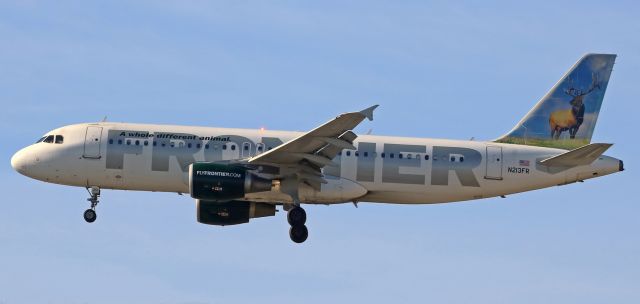 Airbus A320 (N213FR) - This click, taken eleven minutes past high noon, catches "Montana the Elk" (Frontiers N213FR) only a few seconds from completing a Denver-Reno flight.