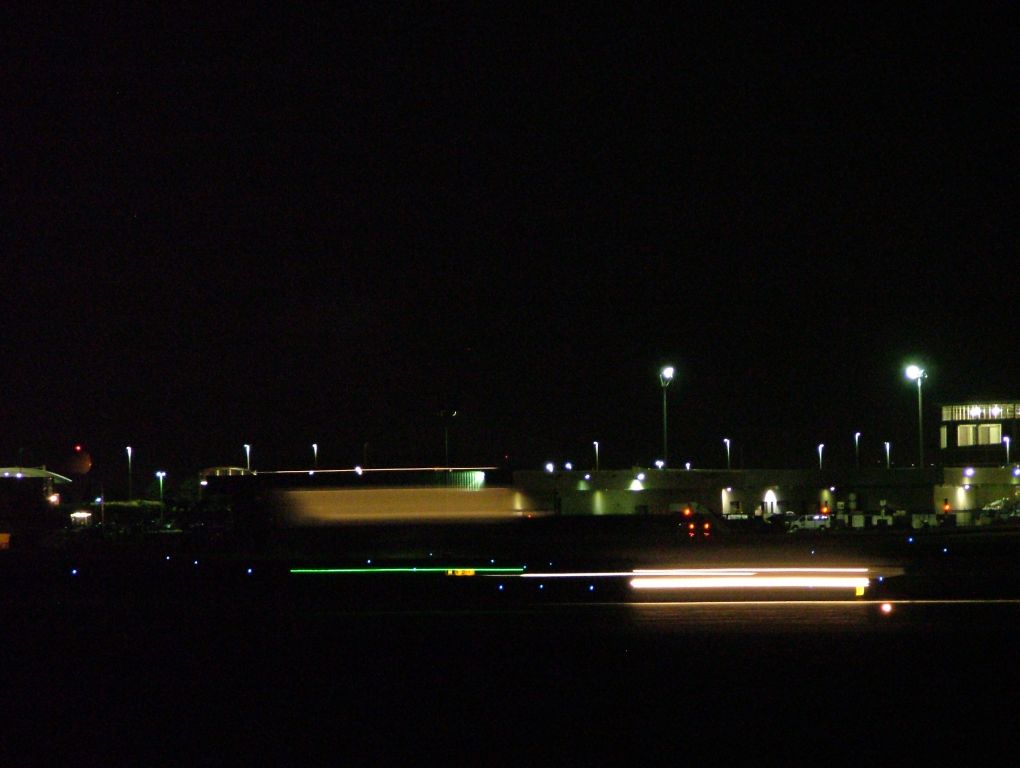 — — - Night landing at Ford Intl