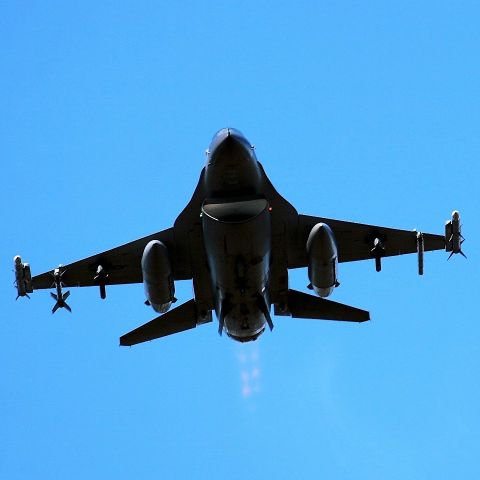 Lockheed F-16 Fighting Falcon — - An F-16 from the WI ANG 115th Tactical Fighter Group with a "Show of Force" low over the crowd during their Open House some years ago Fall 2009.