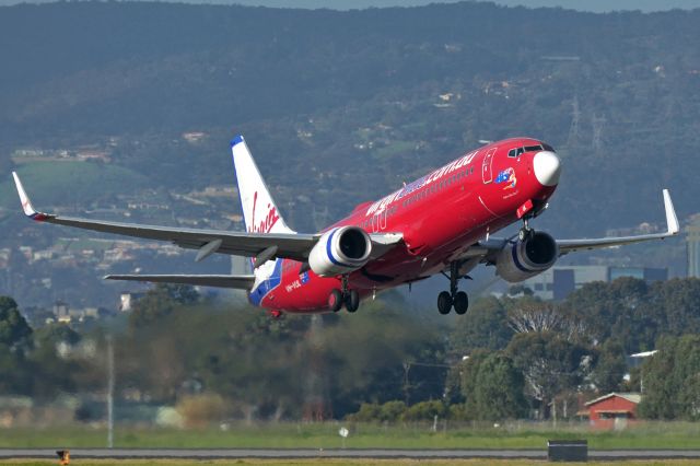 Boeing 737-800 (VH-VUL) - Adelaide, South Australia, August 10, 2014.  Afternoon departure off Rw 23.