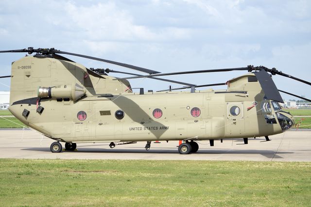 1108098 — - One, of a set of three. On their way to Nebraska from Savannah, likely being delivered to Company B, 2-135th Aviation (GSAB) "Muleskinners". Sister ship 09-8825 sits beside. These are former D-models. August 2013