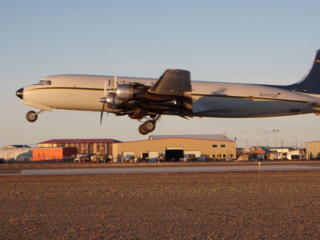 Douglas DC-6 (N747CE) - "Kotzebue Radio, Everts 747 Charlie Echo is airborne. Please activate flight plan." (Everts Air Fuel departing runway 27, Kotzebue Alaska on 10.07.2010