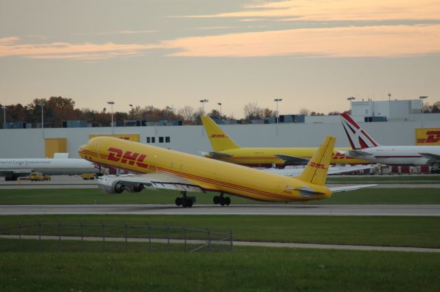 N804DH — - this is 1 of the few DC-8s that are still flyin into DHL at KCVG, taking off from 18L zoom in and look at the back of the plane and how close it is to the ground