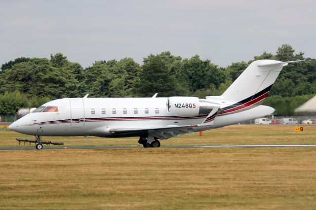 Canadair Challenger (N248QS) - NetJets Aviation Challenger 650 landing on rwy 26 on 20-Jul-22 arriving from EGPF.