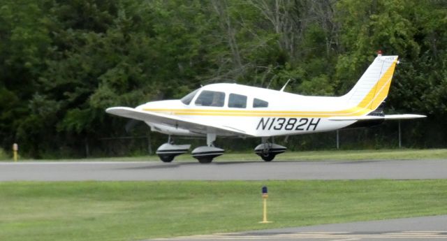 Piper Cherokee (N1382H) - Shown departing is this 1977 Piper Cherokee PA-28-181 in the Summer of 2021.