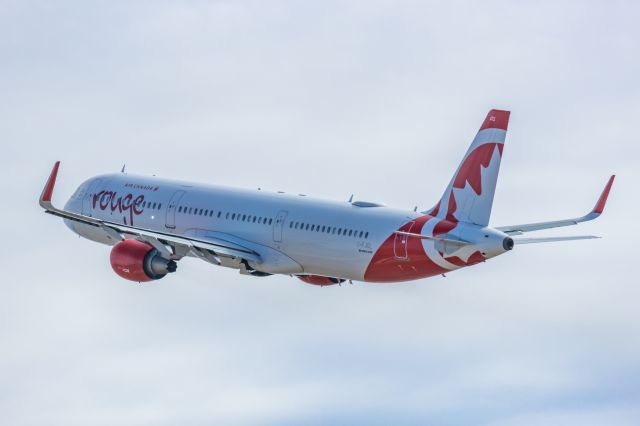 Airbus A321 (C-FJQL) - An Air Canada Rouge A321 taking off from PHX on 2/11/23 during the Super Bowl rush. Taken with a Canon R7 and Canon EF 100-400 II L lens.