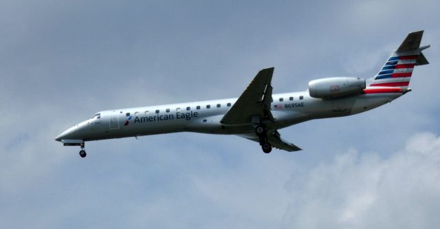 Embraer ERJ-145 (N695AE) - On final is this 2004 American Airlines Eagle Embraer 145LR in the Summer of 2021.