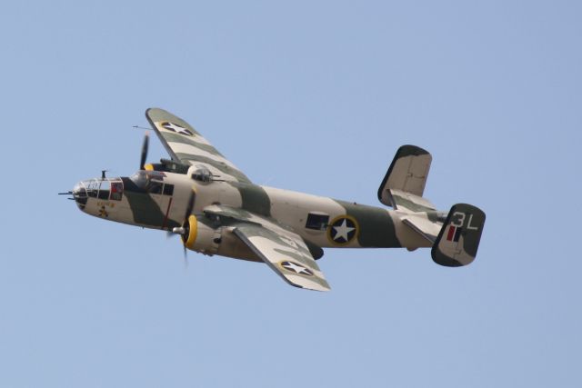 North American TB-25 Mitchell (N62163) - B-25 Mitchell "Killer Bee" performs at MacDill Air Force Base during Air Fest 2011