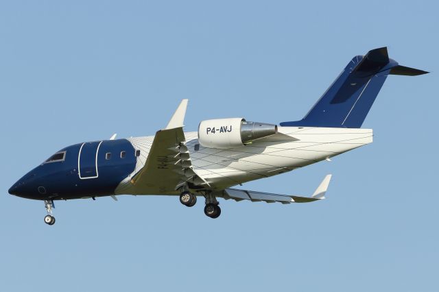 Canadair Challenger (P4-AVJ) - A Bombardier Challenger Buisness Jet, which served as the basis for the successful CRJ series of Regional Aircraft, approaches Stansted Airport.